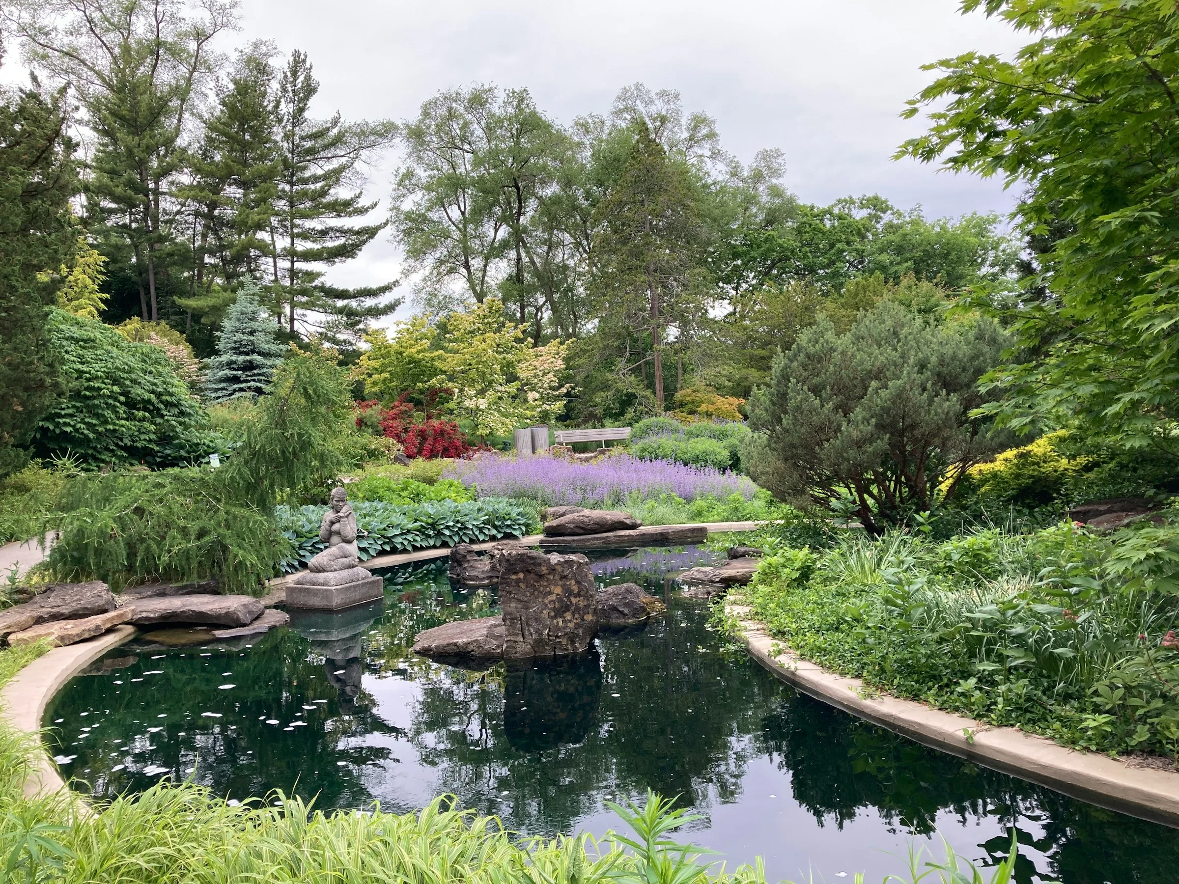 Formal garden pond set within a designed landscape